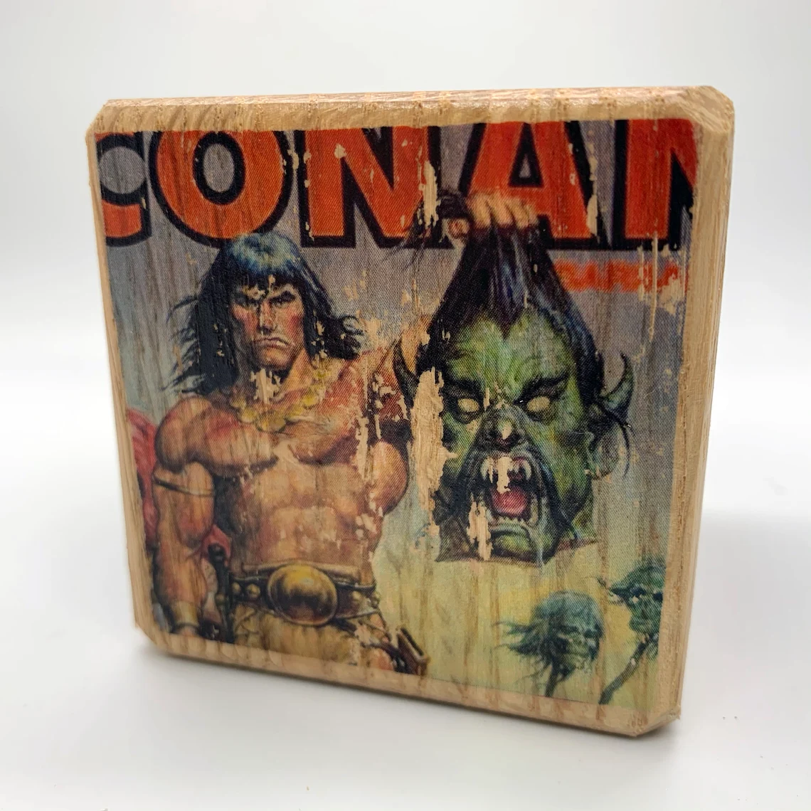Conan holding beheaded beast head Comic Frame
